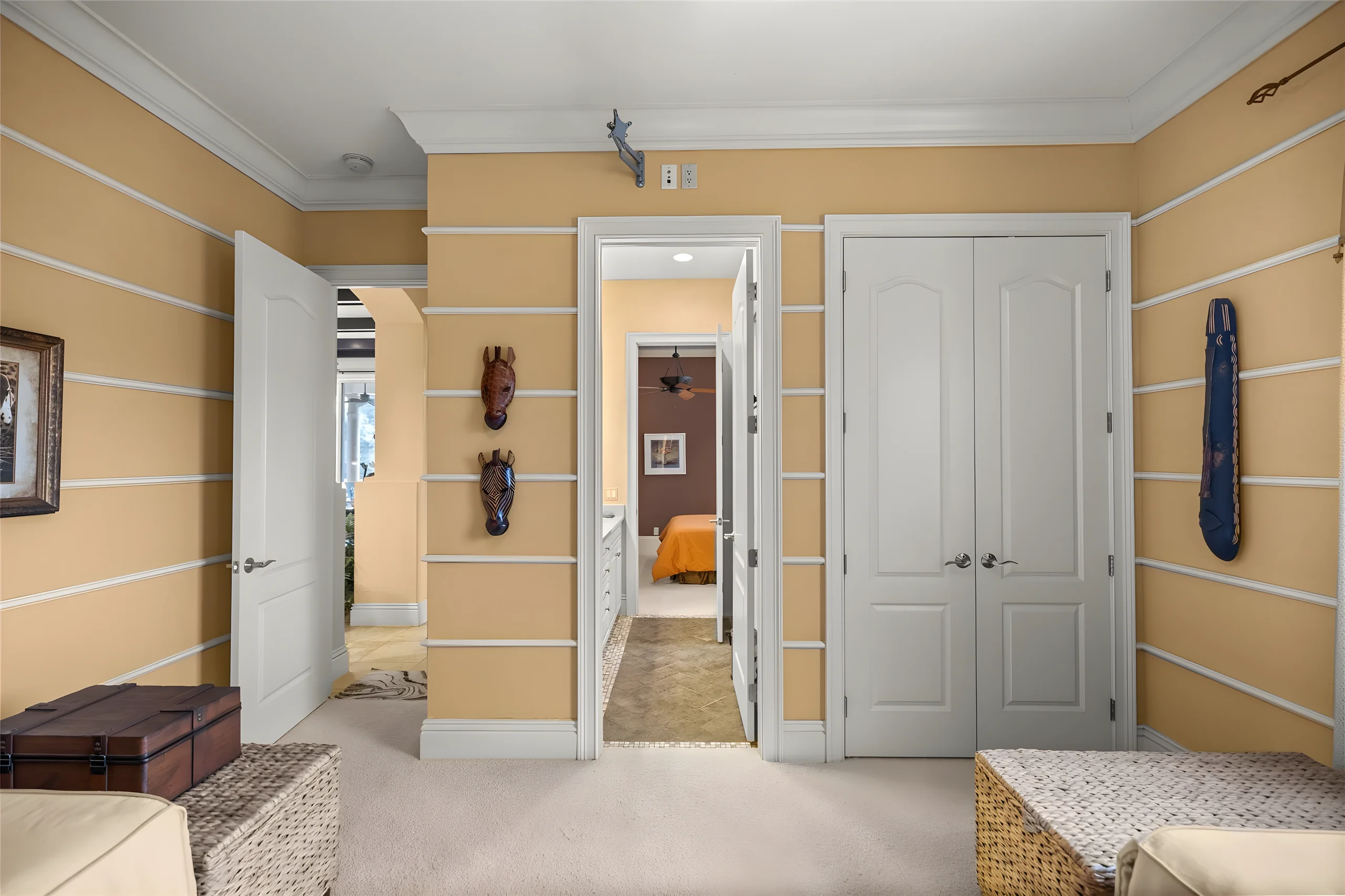 2nd bedroom with a double-door closet and the door through to the jack and jill bathroom