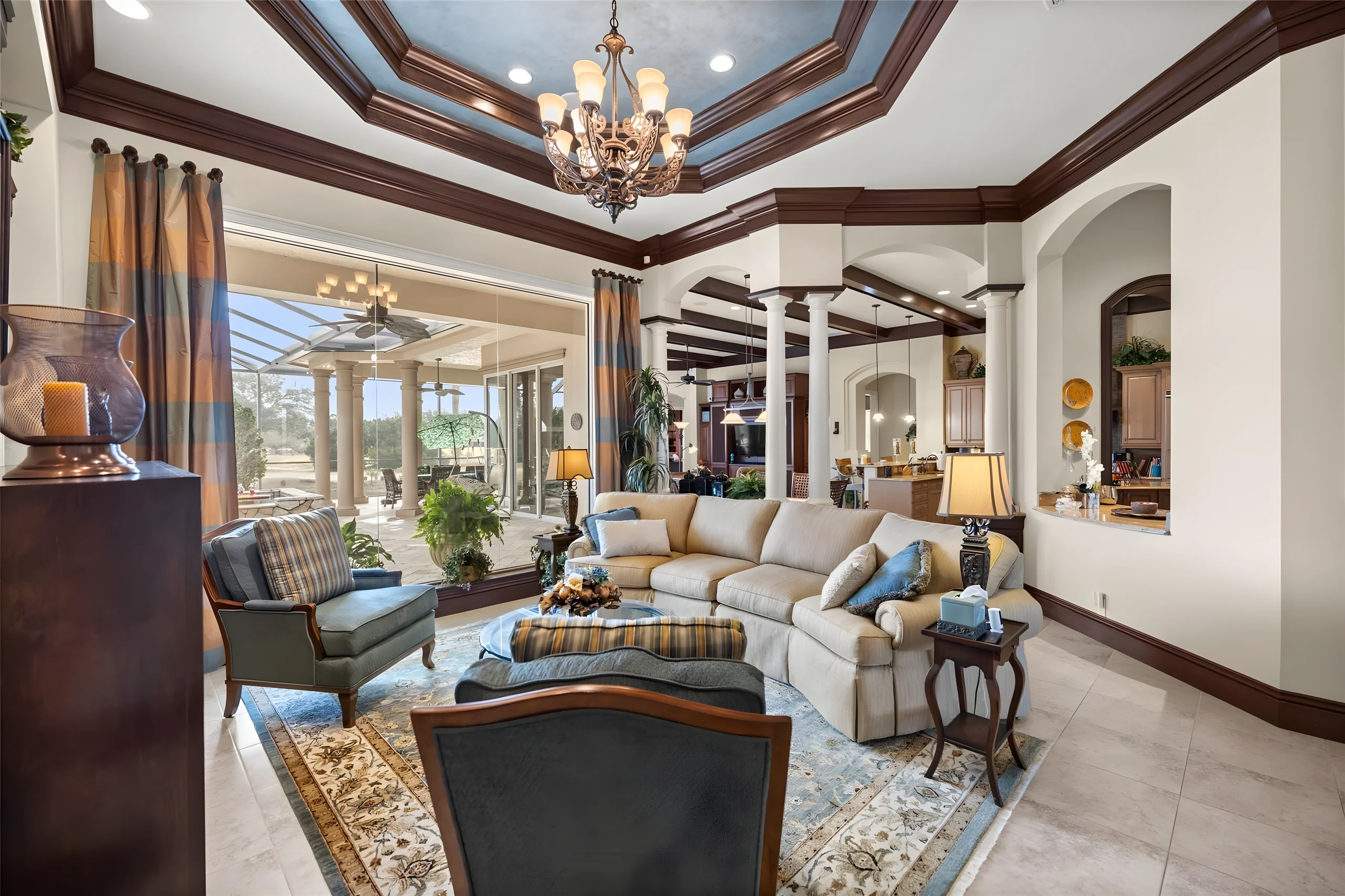 Formal living room looking toward the lanai, the family room and the kitchen