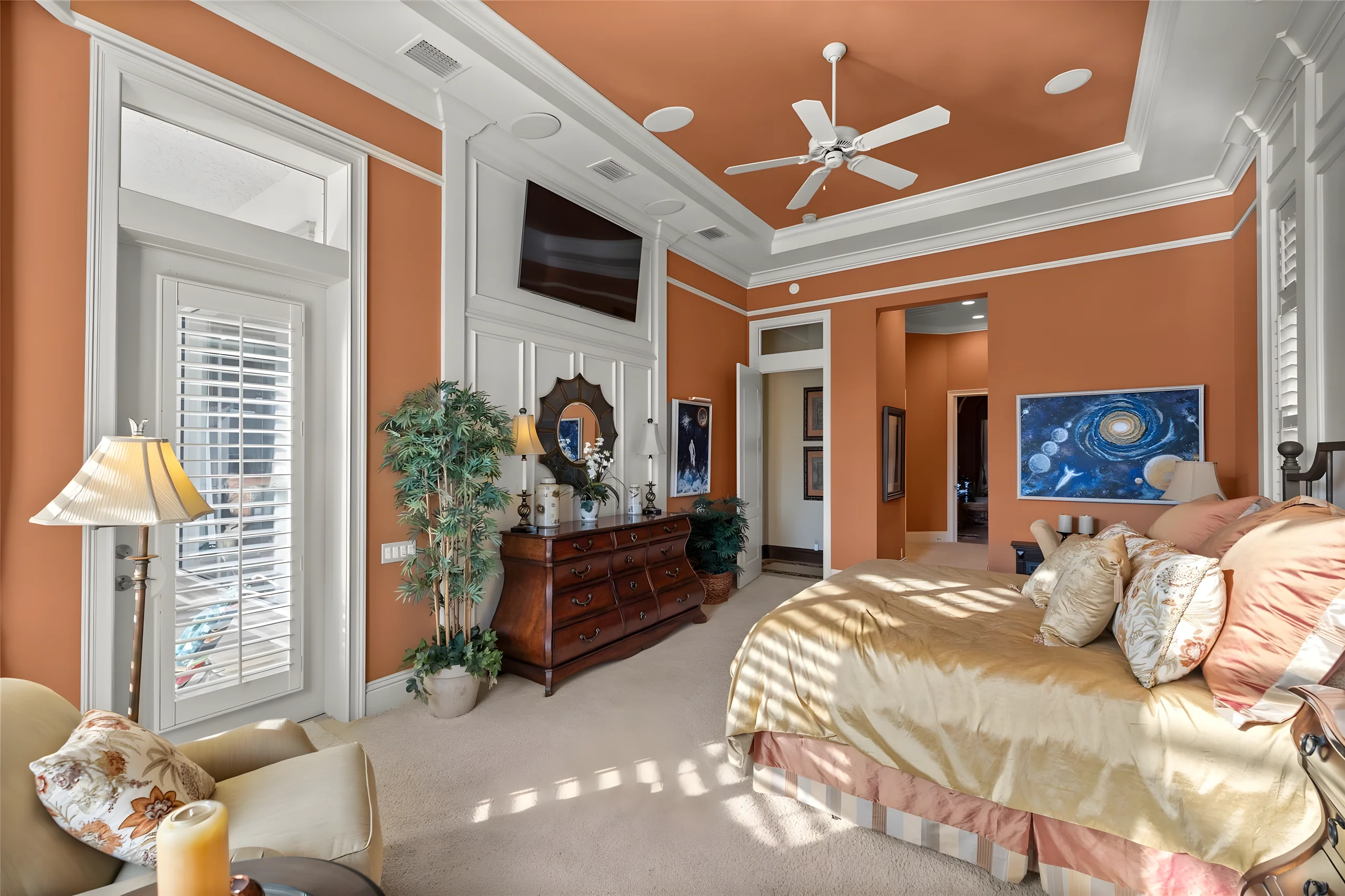 Master bedroom from the bay window, with the door out to the pool and the hall to the master bathroom